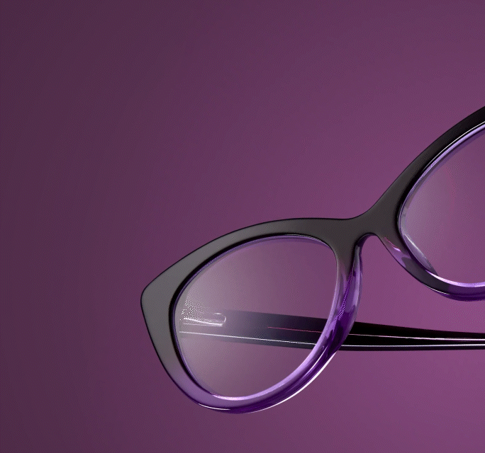 Close-up of cat-eye eyeglasses featuring a black exterior with a vibrant purple translucent inner layer against a deep purple background.