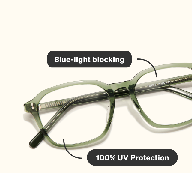 Green Zenni glasses with Blue-light blocking and 100% UV protection lenses on a light blue background.