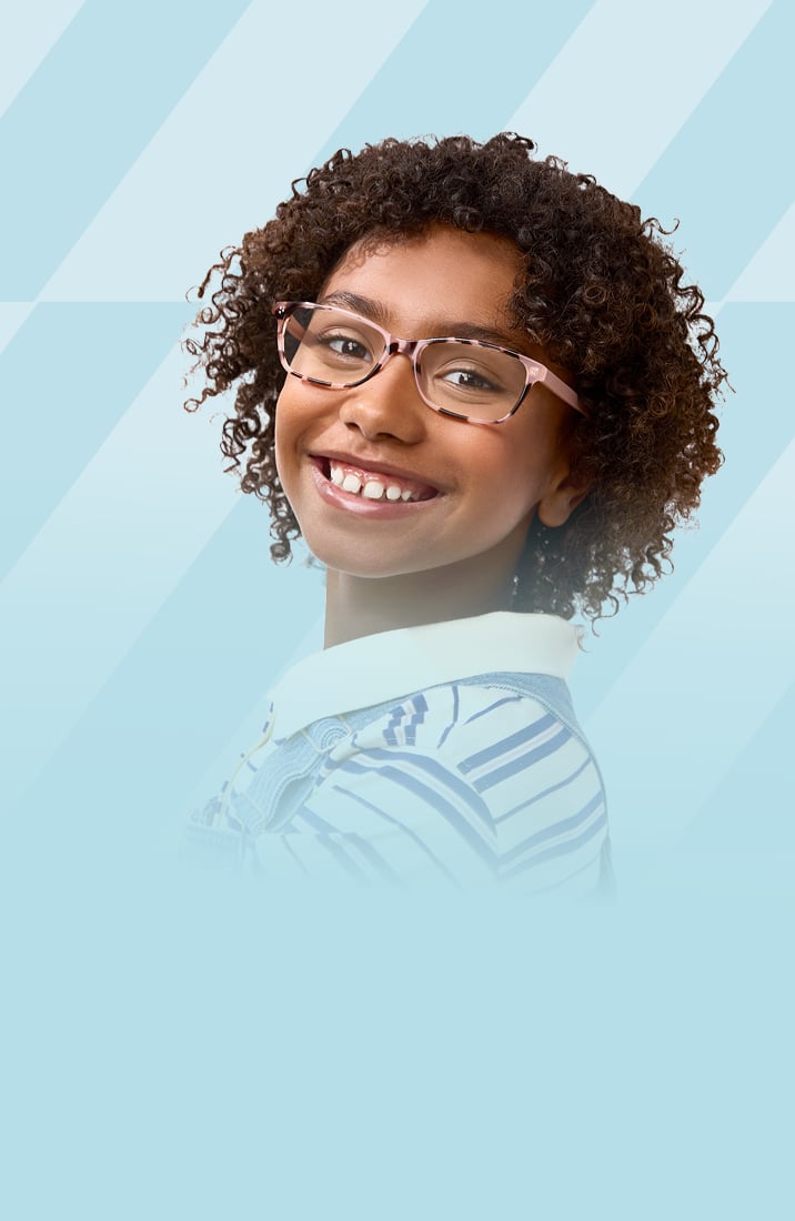 Young girl smiling at the camera in pink tortoiseshell Zenni glasses, with a blue pattern graphic background.