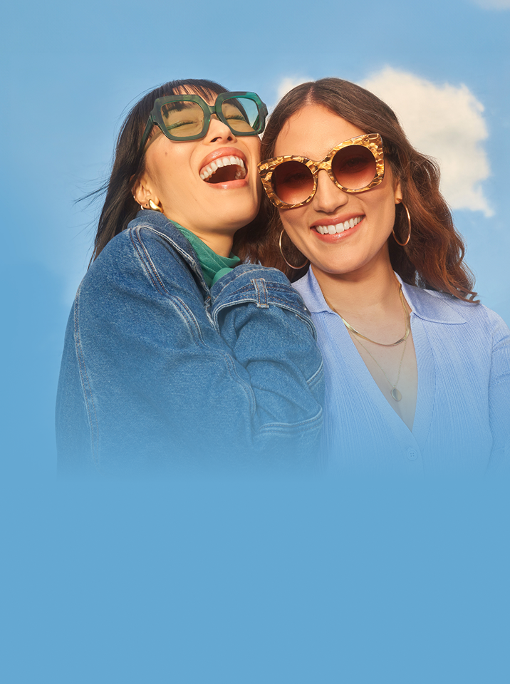 Banner image promoting FSA and HSA usage at Zenni Optical. Two women are smiling and wearing fashionable sunglasses, with a blue sky and clouds in the background.