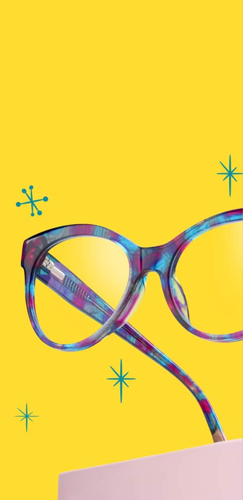 Lentes Zenni con estampado de ojos de gato sobre fondo amarillo con ilustraciones de estrellas azules.