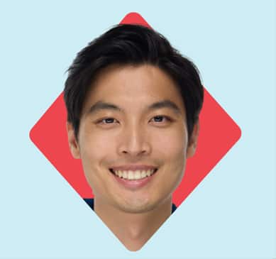 Model framed by a red diamond shape on a light blue background.
