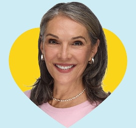 Model framed by a yellow heart shape on a light blue background.