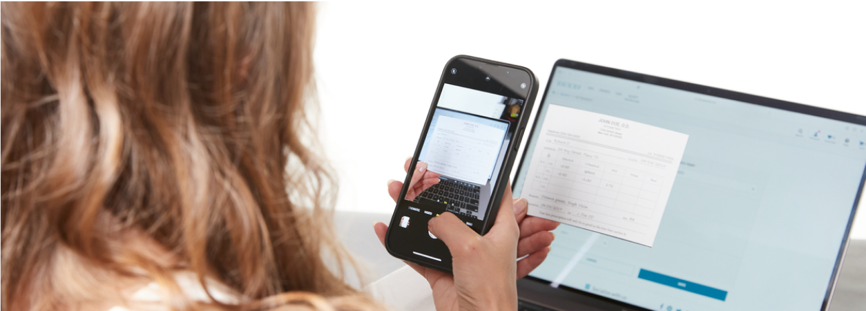 A woman uses the prescription scan to fill in her prescription automatically.