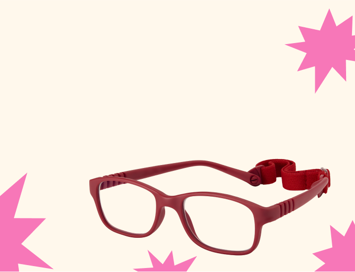 Rectangle red kids’ glasses with flexible temple arms and a head strap, on a beige background with pink starburst shapes.