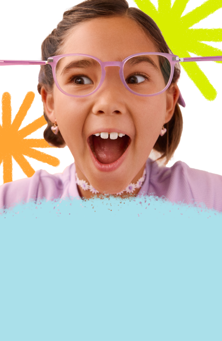 Close-up of an excited young girl with an open-mouthed expression, playfully pulling back the flexible temple arm of her purple round eyeglasses, set against a white background decorated with colorful crayon doodles.