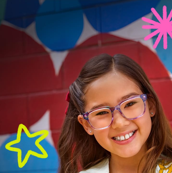 Close-up of a smiling young girl with long brown hair wearing translucent purple rectangular eyeglasses, set against a multi-colored geometric background with neon star and scribble doodles.