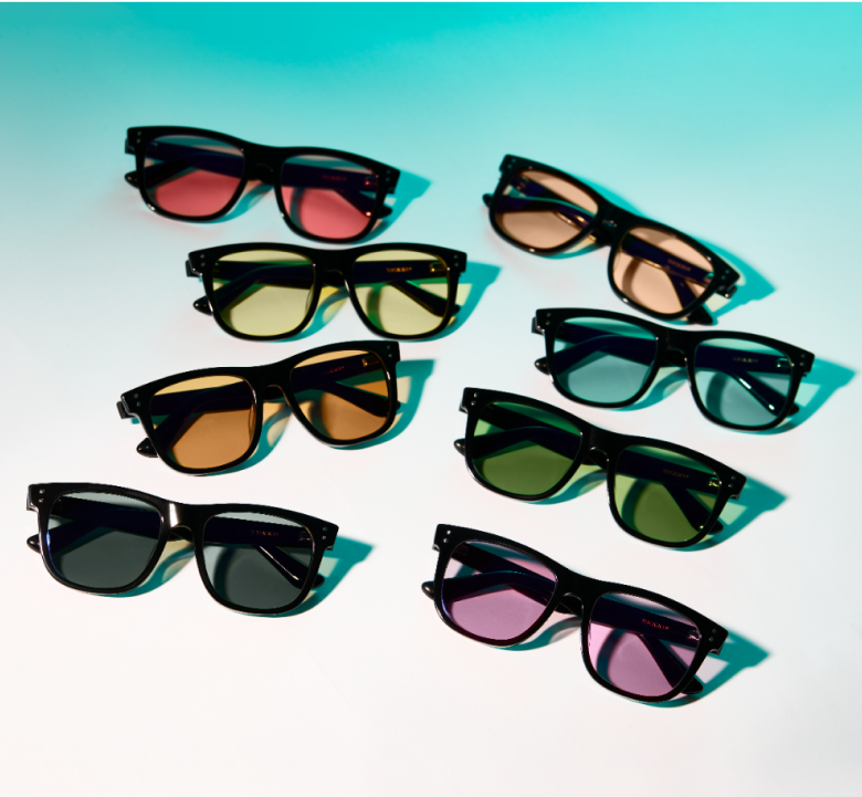 Assorted blue light blocking glasses with colorful lenses.