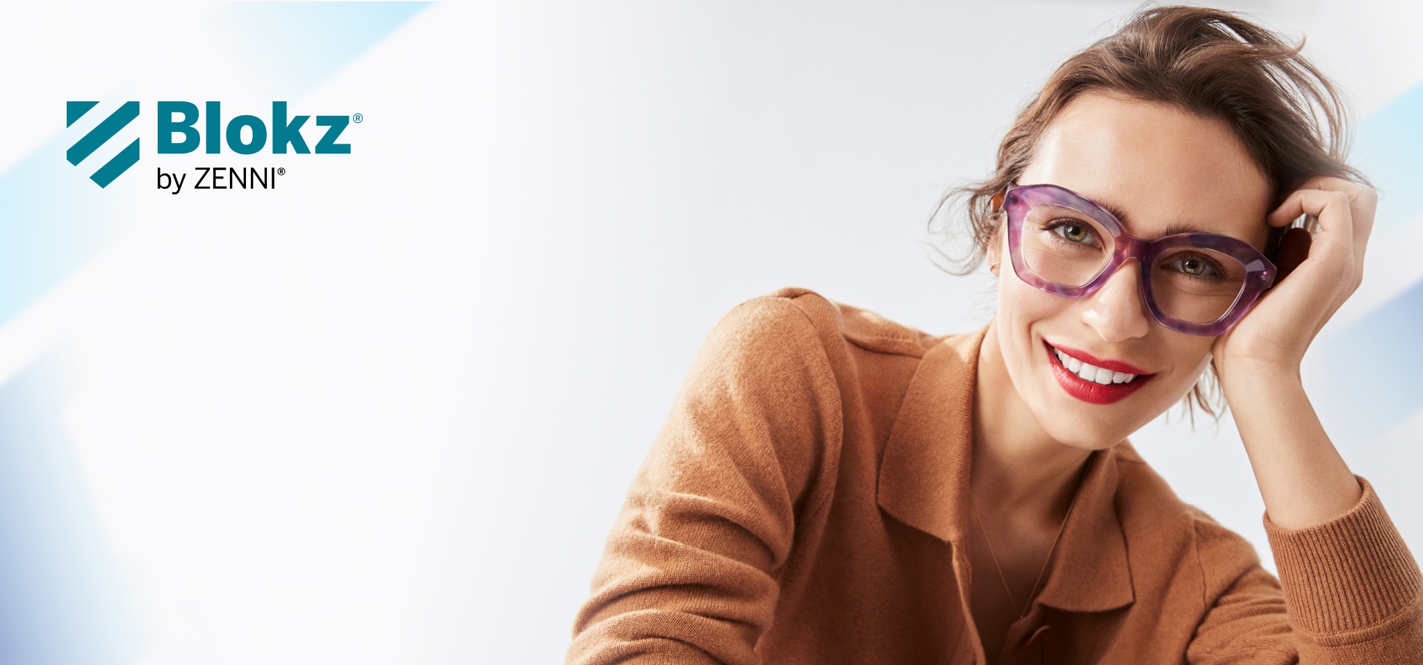 Image of a woman wearing Zenni glasses with blokz lenses.