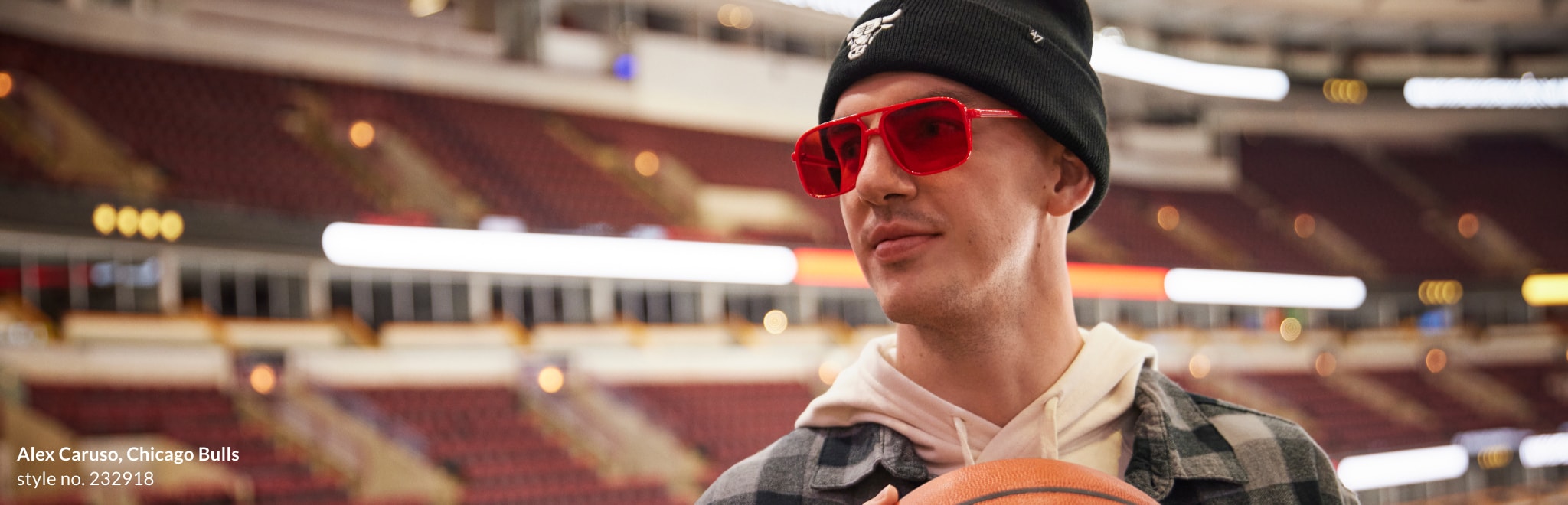 Image of Ryan Arcidiacano wearing Zenni red aviator glasses #232918 inside a basketball arena.