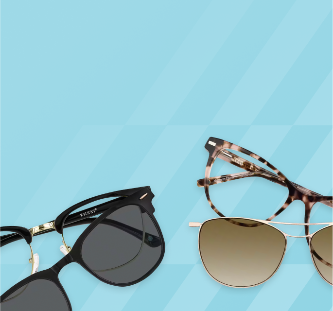 Two pairs of clip-on sunglasses on a light blue background — one black pair with dark lenses and one tortoiseshell pair with gold-tinted lenses.