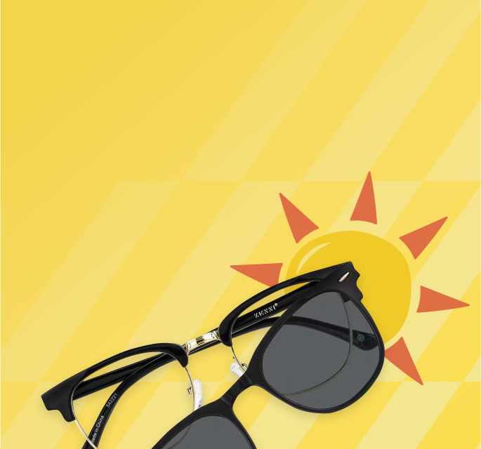 Black clip-on sunglasses with dark lenses against a bright yellow background with a stylized orange sun illustration.