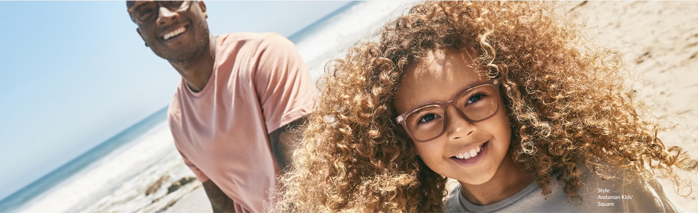 Image of a father and daughter duo on the beach, wearing Zenni ReMakes glasses.