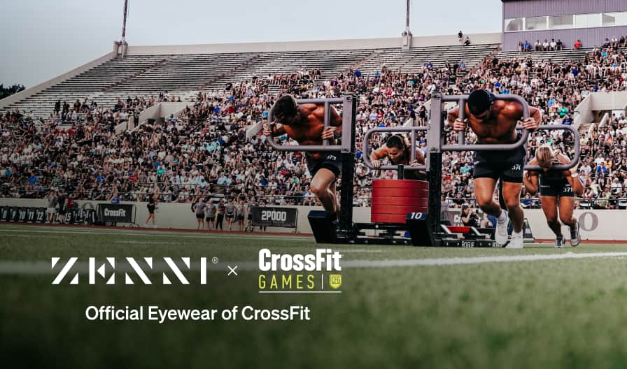 The Zenni logo and the CrossFit logo (white type over yellow type and a CFG shield logomark) over an image of CrossFit athletes competing in a weight pull exercise across a turf field within a stadium filled with event spectators.