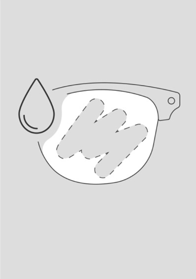 Sketch of a glasses lens with a water droplet in front of it. The lens appears to have streaks across it, because it is fogged up.