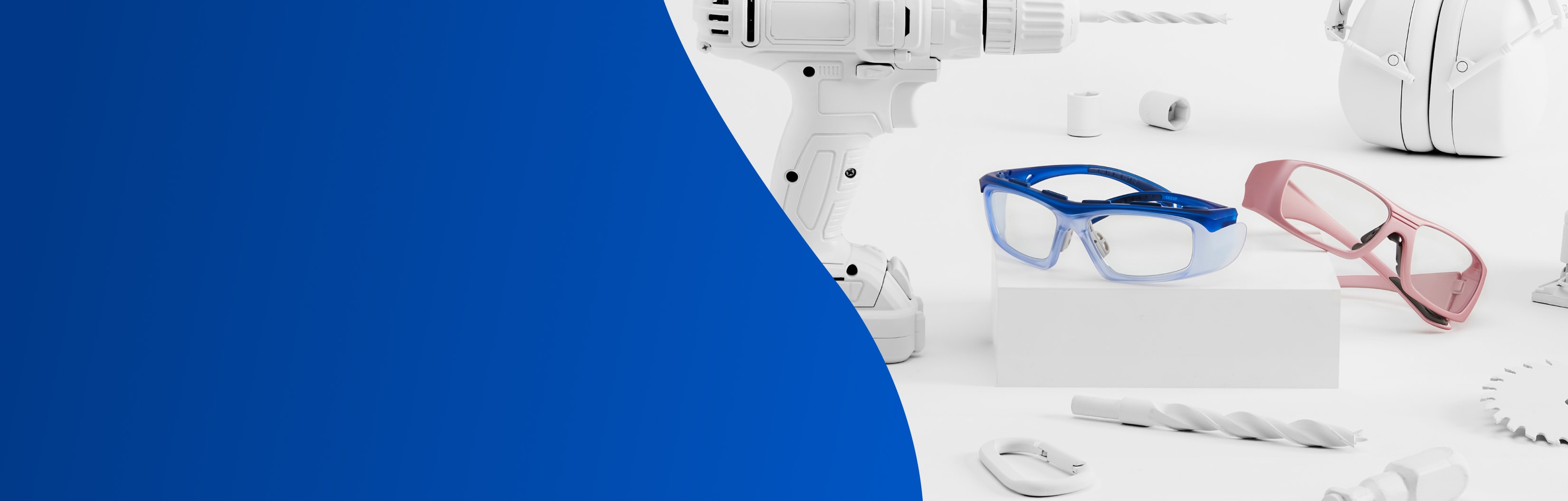 Image of Zenni Z87.1 safety glasses #748916 and #749119 on a white platform, surrounded by tools that are painted white.