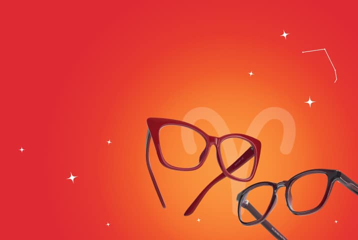 Bold red and black Zenni eyeglasses set against a fiery red-orange background with Aries symbol and constellation.