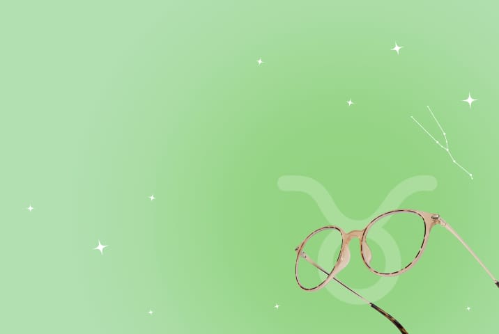 Elegant blush-toned Zenni glasses on a green background with Taurus symbol and constellation.
