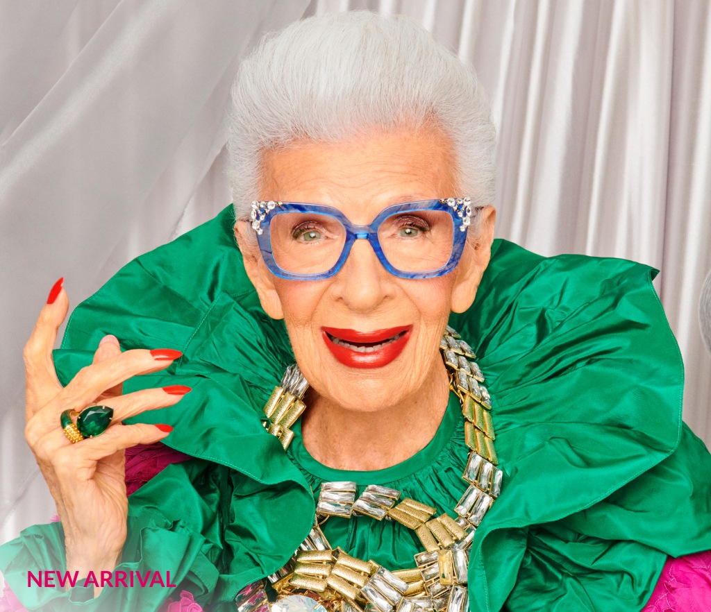 Image of Iris Apfel wearing puttin’ on the glitz square glasses #44533 against a silver curtain background.