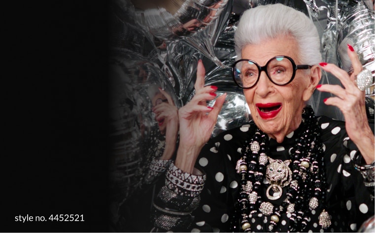 Iris on turning 100. Find out what the ‘world’s oldest living teenager’ has to say. Watch now. Image of Iris Apfel wearing zenni iris apfel round glasses #44525, with her nails painted bright red.