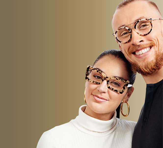 Image of Claire and George Kittle wearing Zenni lettey cat-eye glasses #4449335 and Zenni the people’s frames round glasses #7826135 respectively, against a white background.