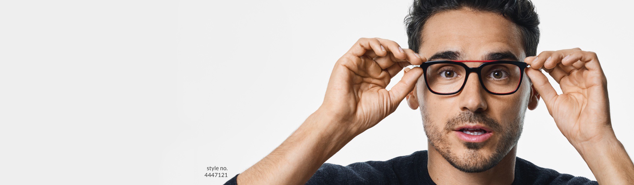Image of a man in a black shirt wearing Zenni square glasses #4447121, against a white background.