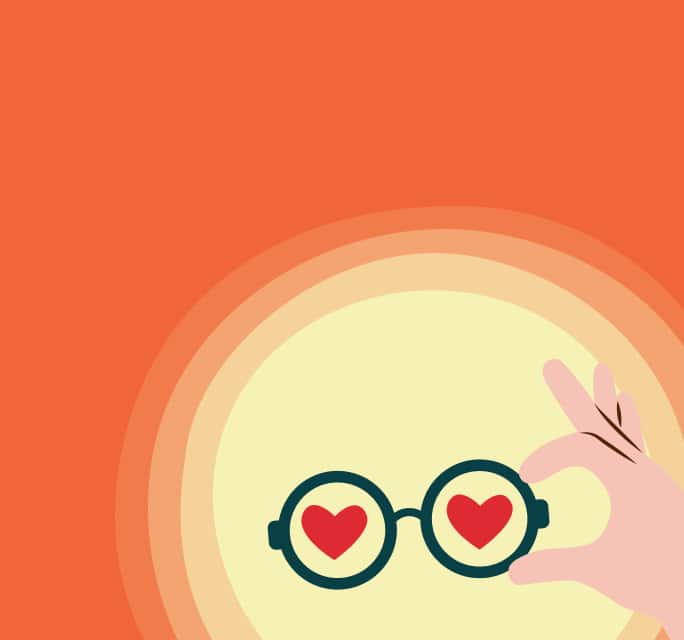 Colorful illustration of a hand holding round dark frames and red heart shapes in the lenses, against an orange and yellow background.