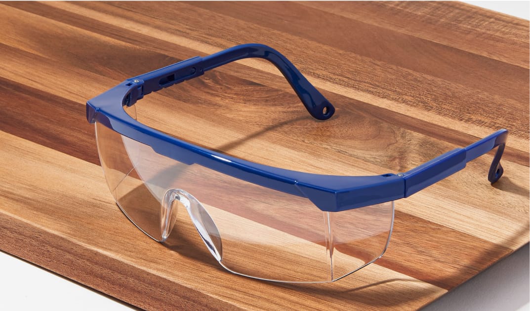 Image of Zenni protective goggles #A70180316 on a wood background.