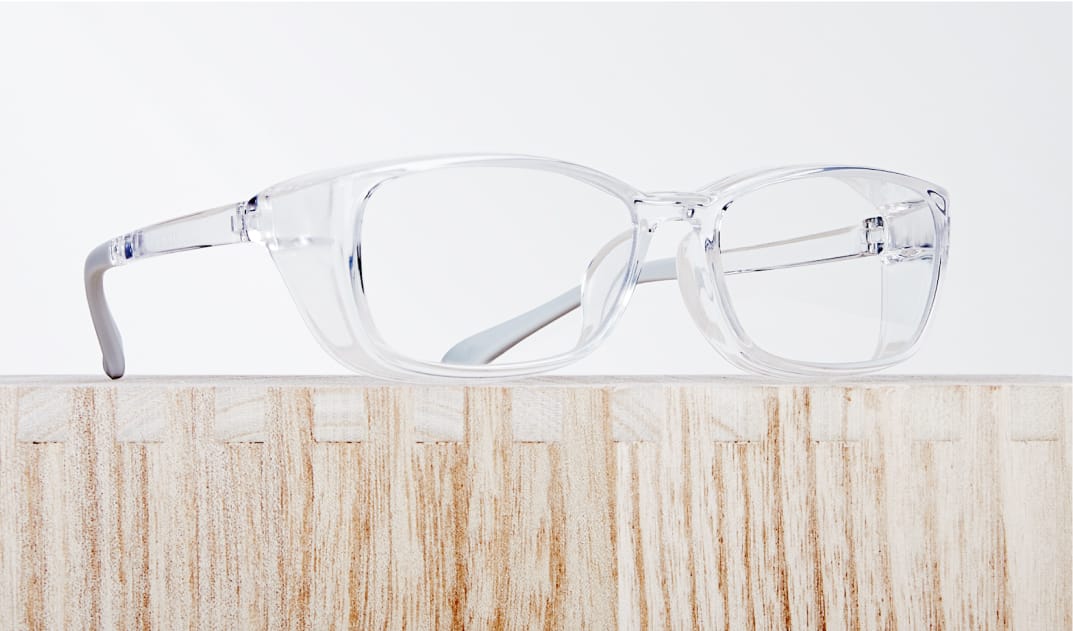 Image of Zenni protective glasses #743923 on a beige background.