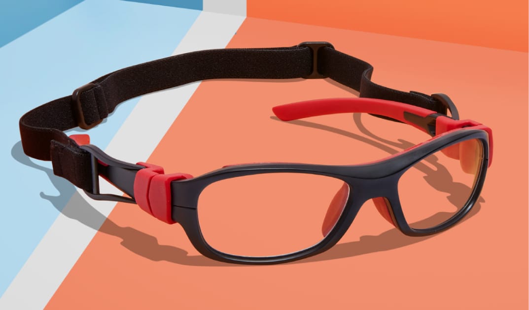 Image of Zenni sport protective goggles #743321 on an orange and blue background.