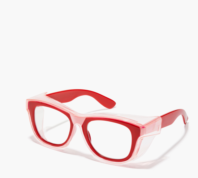 Red eyeglasses with clear snap-on protective shields on a white background.