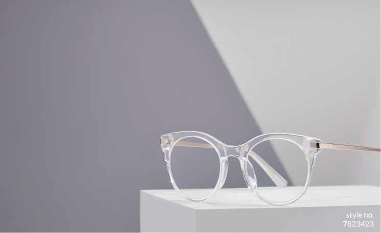 ZZenni translucent round glasses #7823423 on a white display box with a two-tone gray background.