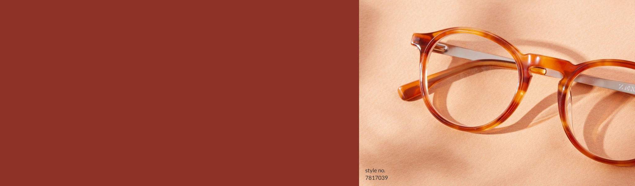 Shades of fall. Embrace the season with earth-toned eyewear inspired by nature. Image of Zenni round glasses #7817039, with the sun shining on them, against a peach-colored background.