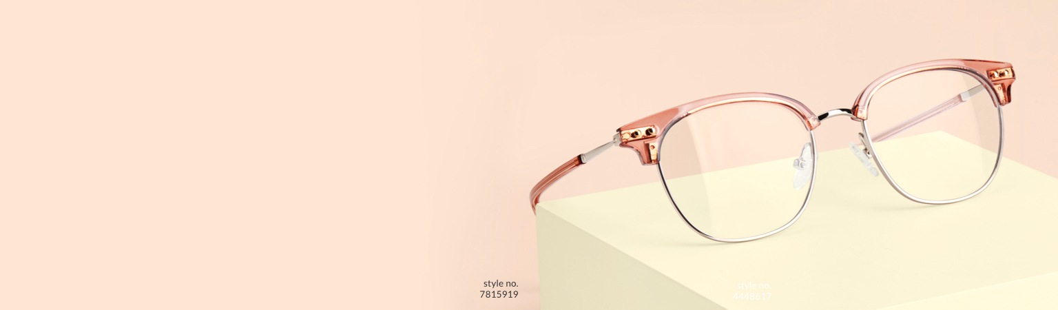 Zenni browline glasses #7815919 displaying on a cream color block on a peach-colored background.