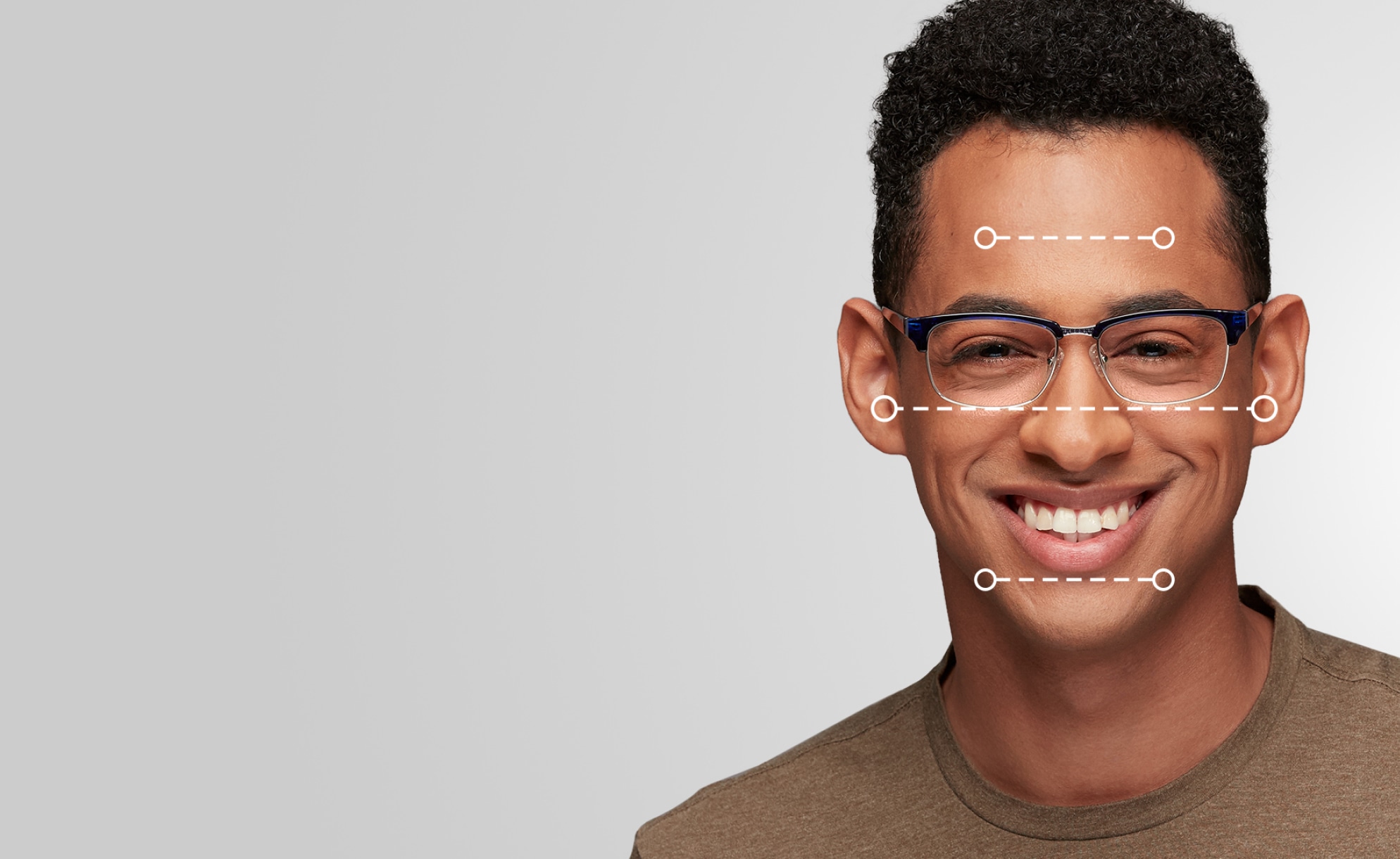 Diamond face shape. Oval and browline glasses add softness to angular diamond faces. Frames for diamond faces. Image of a man wearing Zenni glasses, with dotted lines over his face showing the various dimensions of his face.