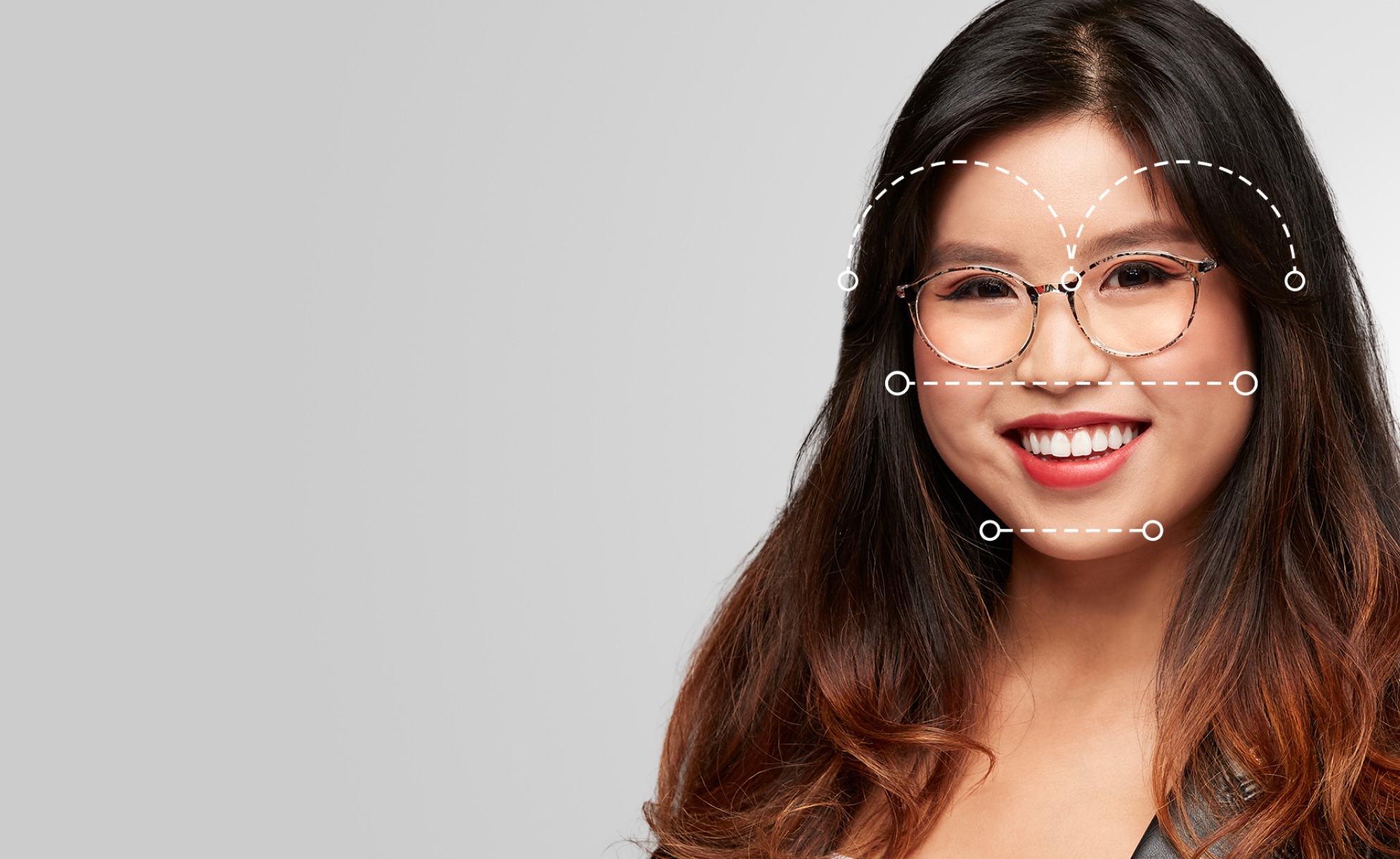 Square and aviator glasses bring softness and balance to angular heart faces. Image of a woman wearing Zenni glasses, with dotted lines over her face showing the various dimensions of her face.