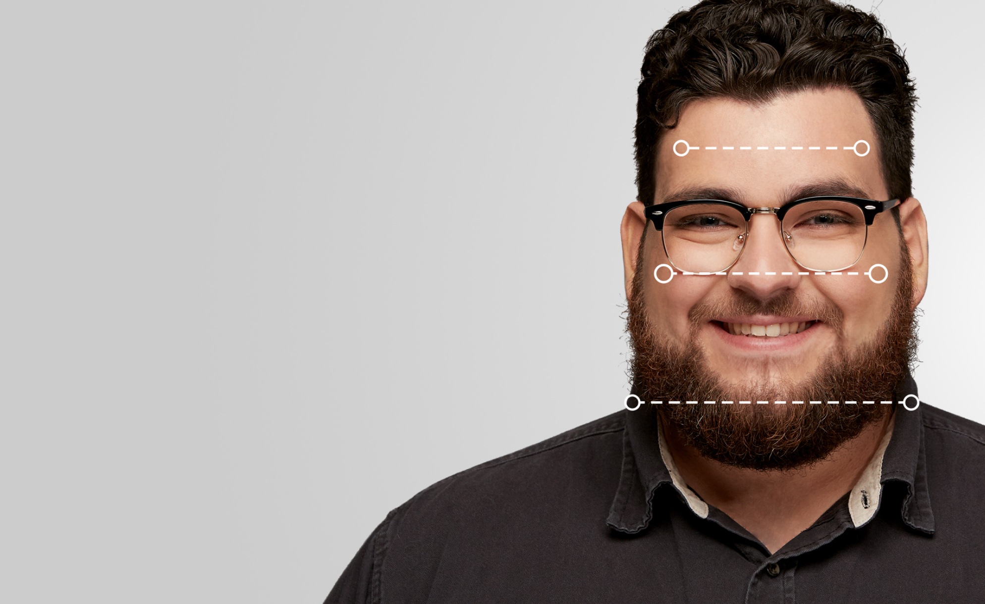 Triangle face shape. Triangle faces get balance from browline and rectangle glasses. Frames for rectangle faces. Image of a man wearing Zenni glasses, with dotted lines over his face showing the various dimensions of his face.