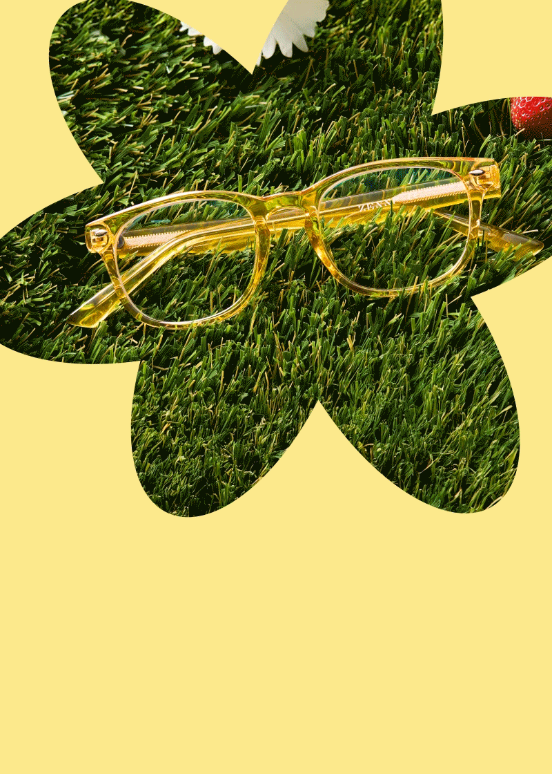 A series of spring-inspired glasses framed within large flower-shaped cutouts against a butter-yellow background.
