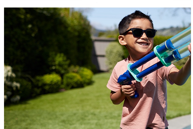 Photochromic lenses are clear indoors and darken in bright sunlight to protect your child’s eyes outdoors.