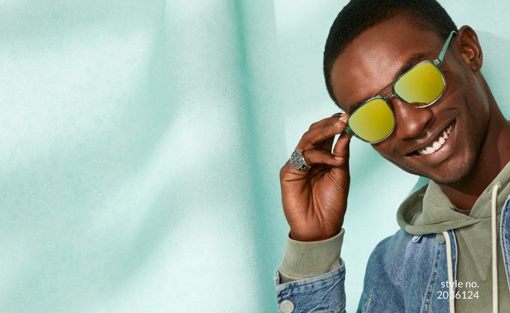 Image of a man wearing Zenni aviator glasses #2036124 as sunglasses against a teal background.