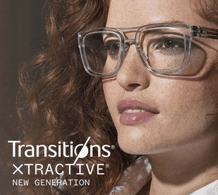 A woman wearing clear rectangle frames with Transitions lenses that go from clear to dark.