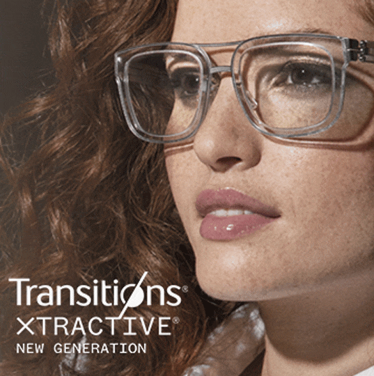 A woman wearing clear rectangle frames with Transitions lenses that go from clear to dark.