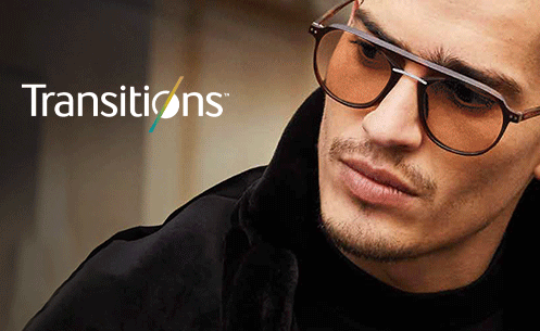 Image of a man wearing glasses with Transitions lenses in them.