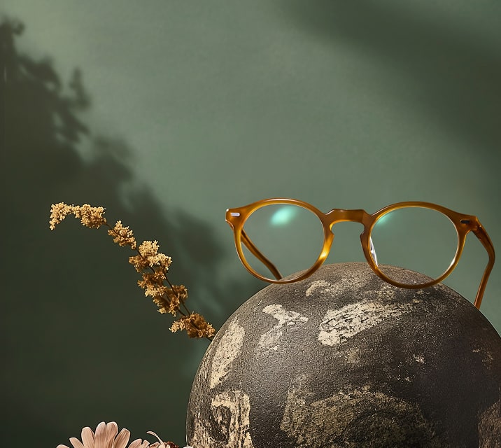 Round Zenni amber glasses styled with fall-themed decor.