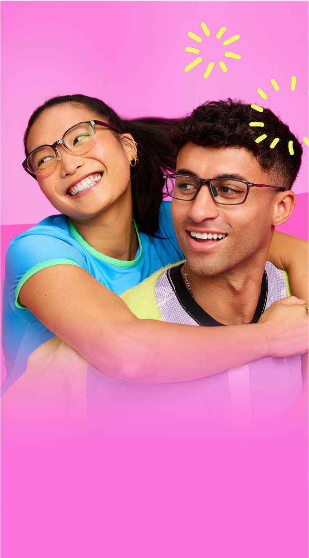 Two people smiling and wearing stylish glasses against a bright pink background with yellow graphic accents.