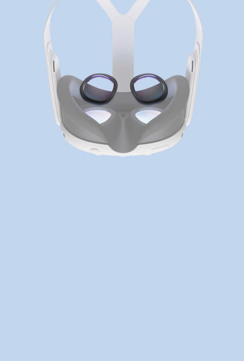 Meta Quest 3 VR headset facing downwards with two lens inserts hovering above, to be placed on top of VR lenses. Blue background.