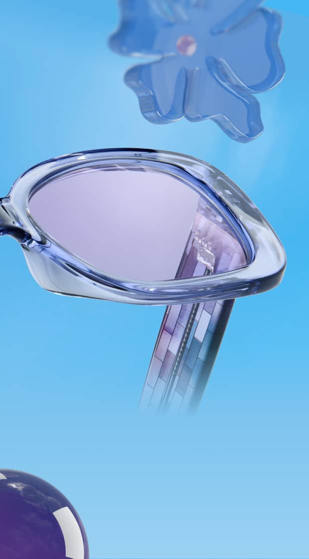 Close-up graphic of translucent blue eyeglasses with light purple tinted lenses floating against a bright blue background, surrounded by a 3D blue flower and a purple sphere.