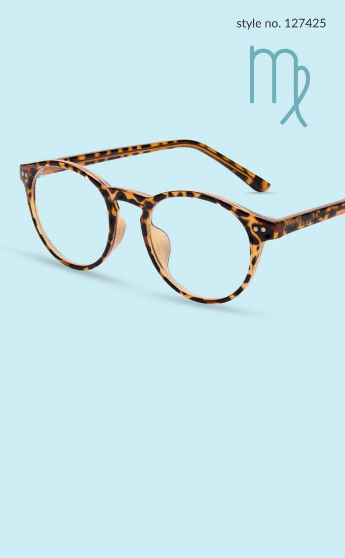 A pair of round, tortoiseshell glasses style no. 127425, is displayed against a light blue background with the Virgo zodiac symbol in the top right corner.