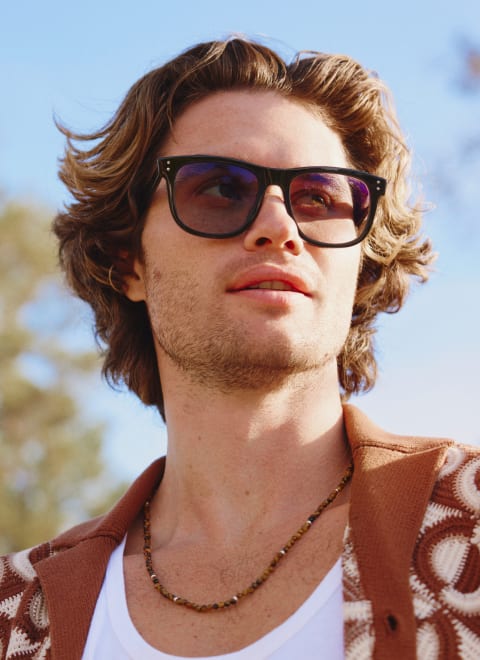 Chase Stokes wearing black Zenni sunglasses promoting Zenni’s Vision of Wellness collection for mental health support.