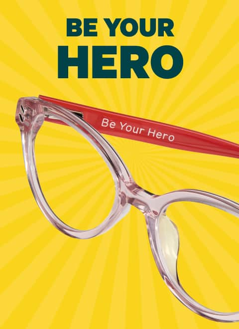 Red and clear Zenni glasses engraved with 'Be Your Hero,' part of Zenni’s Vision of Wellness collection supporting kid’s mental health.